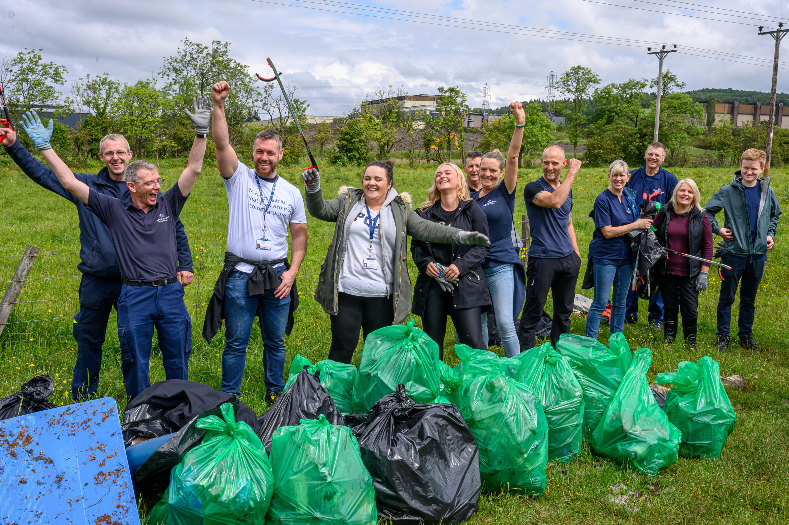 Team of litter pickers at team building event