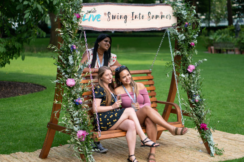 Smart Summer Party at Inner Temple Garden - guests on swing