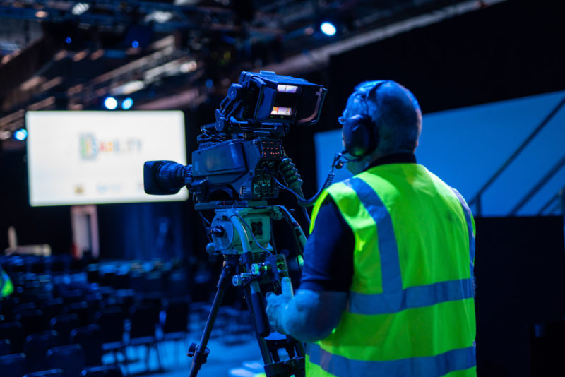 camera man filming a virtual conference