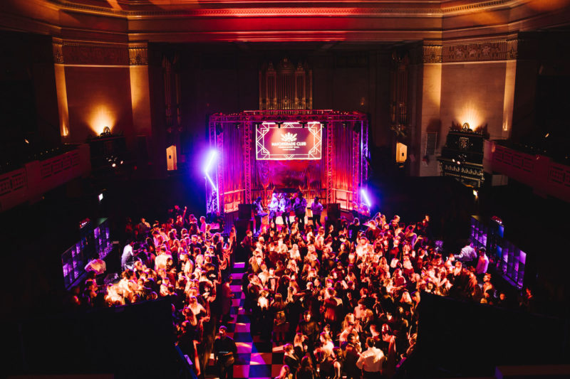 Guests dancing in the Masquerade Club